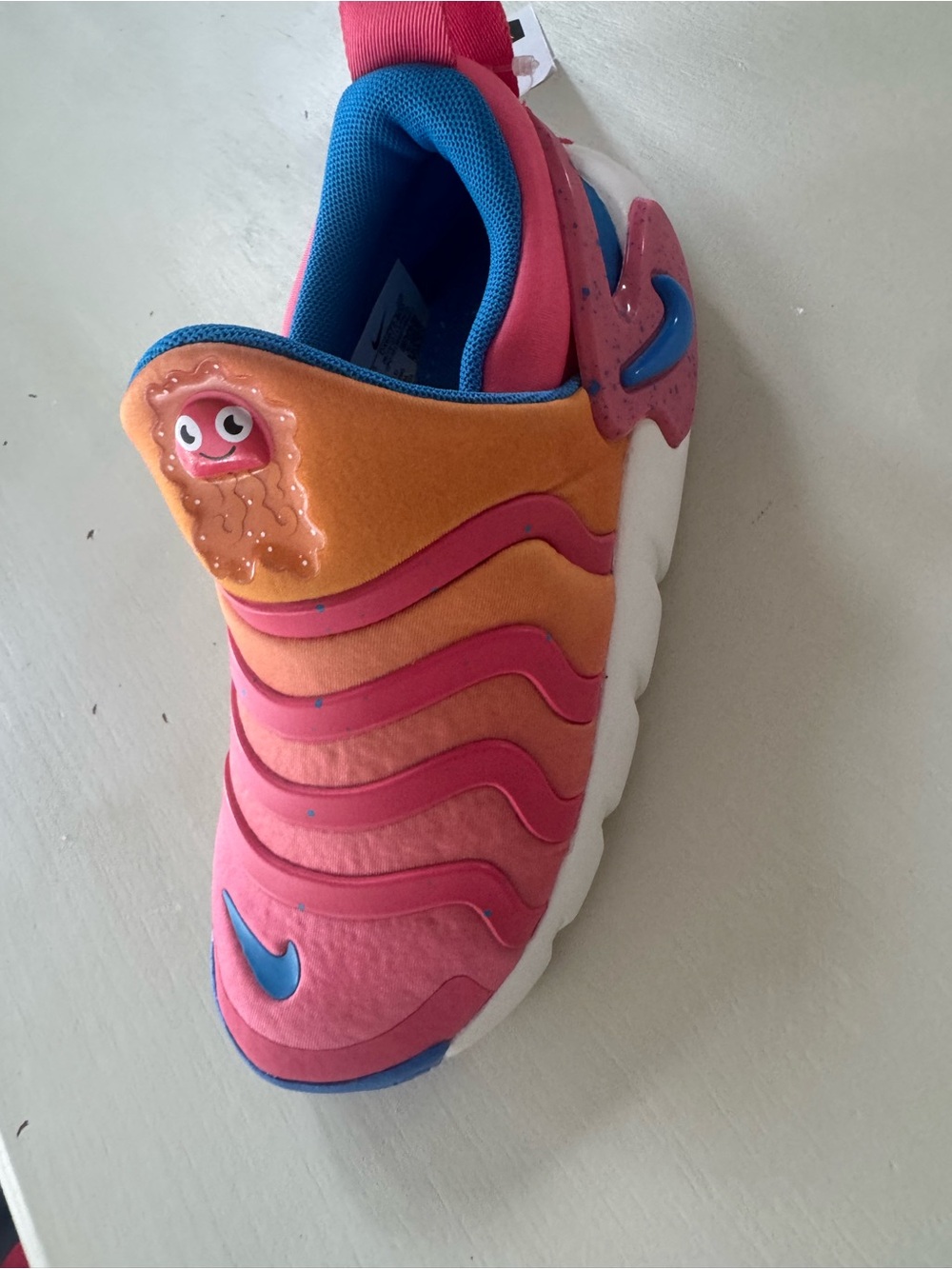 Nike Kids Slip-On Wave Sneakers in Pink, Orange & Blue